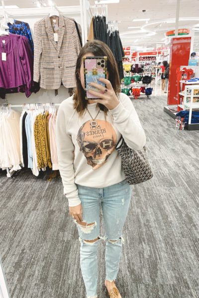 hermes skull sweatshirt with ripped jeans and goyard st louis pm