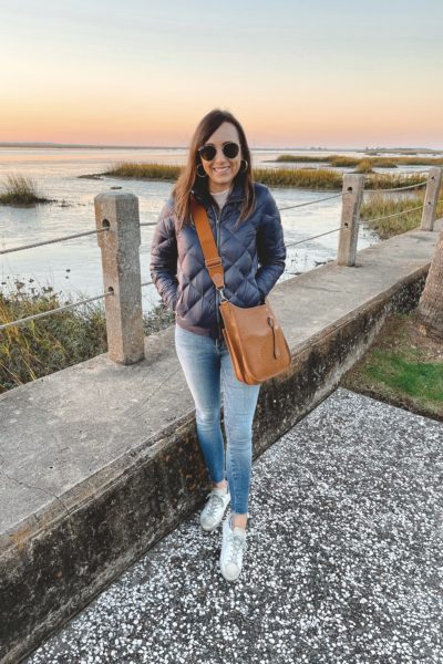 patagonia navy puffer jacket with hermes evelyne and golden goose sneakers at jekyll island