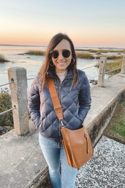 patagonia navy puffer jacket with hermes evelyne and rayban sunglasses at jekyll island