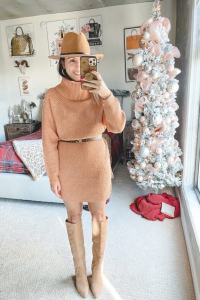 salmon pink sweater dress with knee high boots and louis vuitton belt