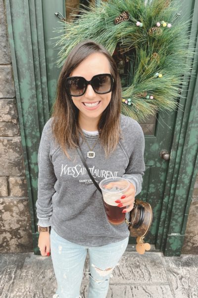 saint laurent grey sweatshirt with ripped jeans and louis vuitton palm springs mini
