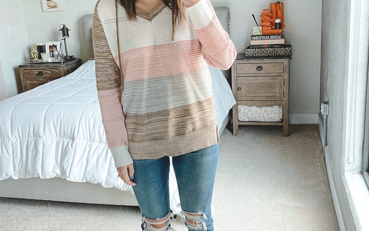 amazon pink hooded sweater with ripped jeans and booties