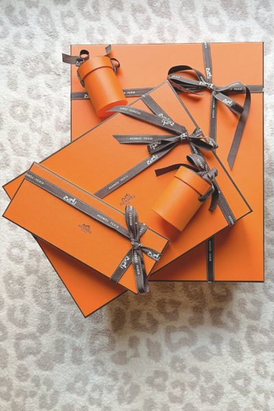 stack of orange hermes boxes