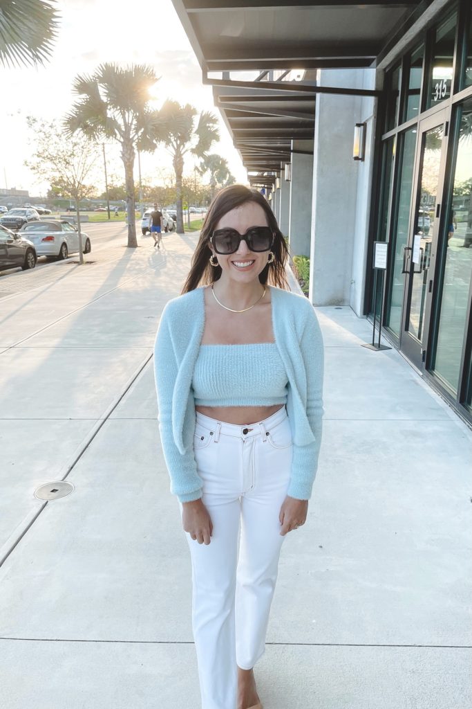 blue cardigan and crop tank set with white agolde jeans