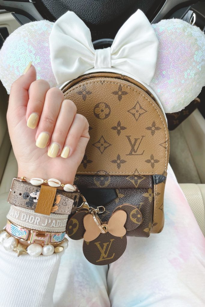 opi one chic chick with louis vuitton palm springs mini and bracelets