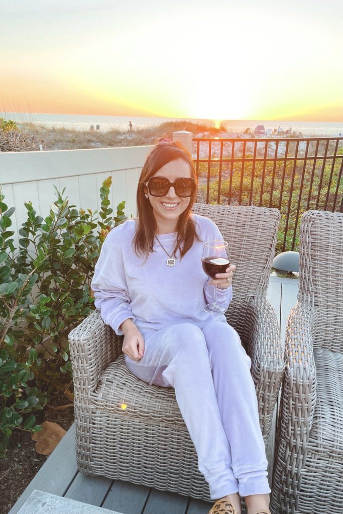 lavender lounge set with wine and sunset