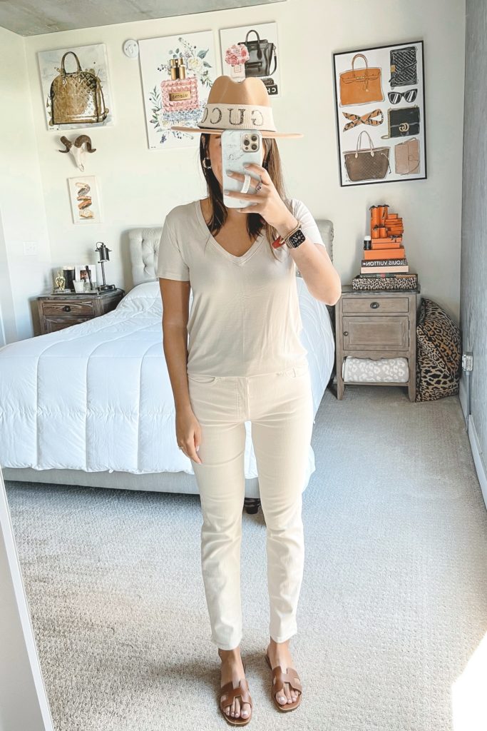 abercrombie cream tee with cream jeans and braided sandals