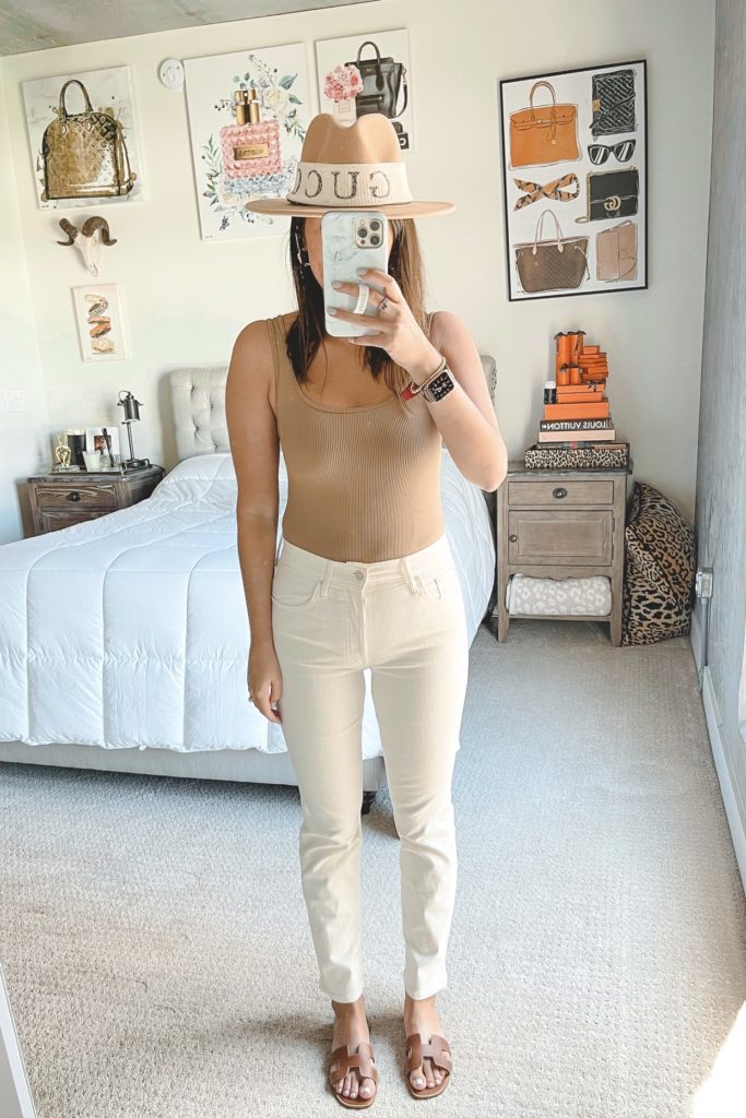 abercrombie 90s ribbed bodysuit with cream jeans and braided sandals