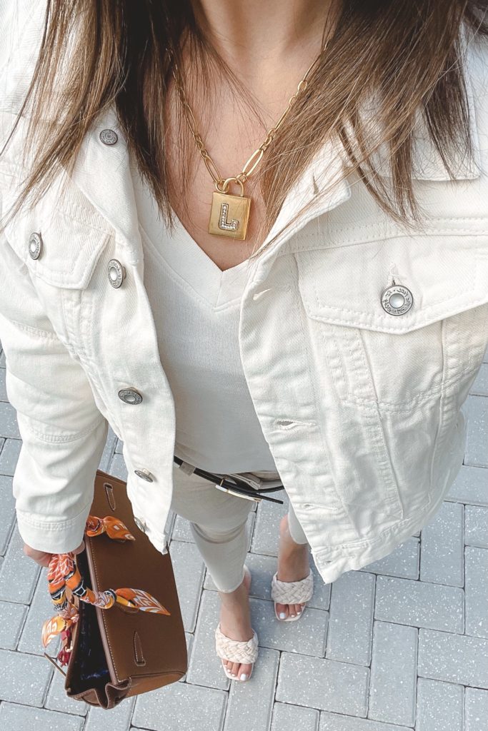 free people rumors denim jacket ecru with l'agence marguerite jeans biscuit and sequin initial necklace
