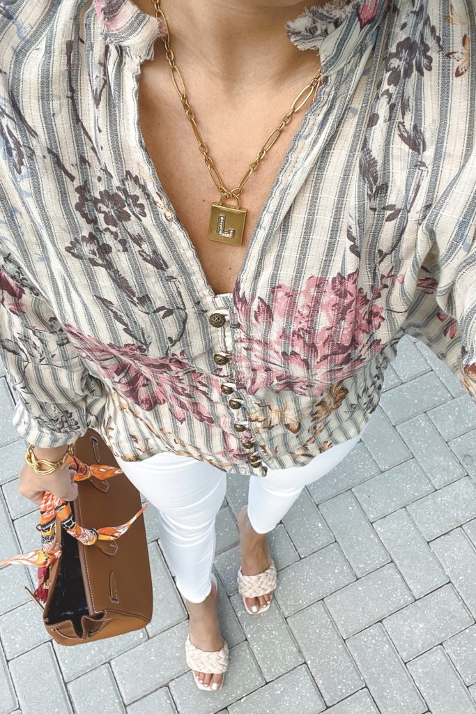 pilcro tavi blouse with white skinny jeans and initial necklace