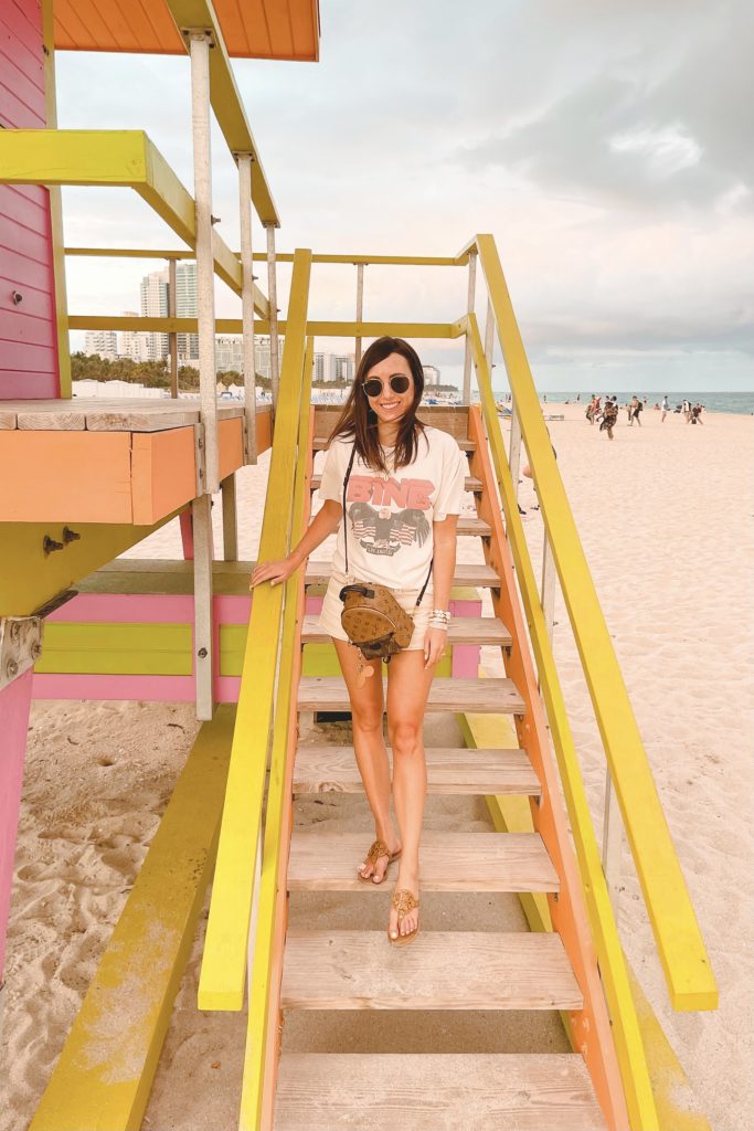 anine bing white vintage tee with cream shorts in miami beach