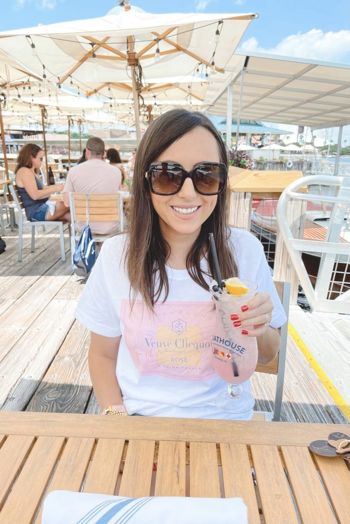 veuve clicquot tee with gucci sunglasses at boathouse orlando