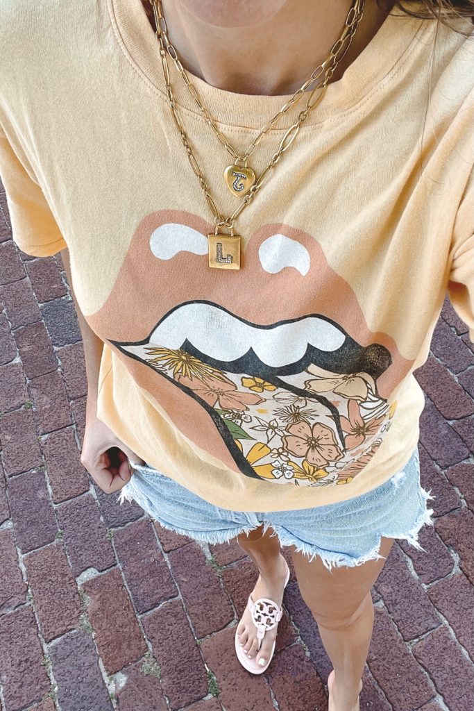 daydreamer floral rolling stones tee with agolde shorts and sequin nyc necklaces