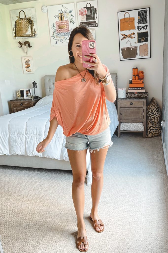 amazon coral off the shoulder tee with agolde denim shorts and gucci necklace