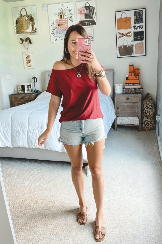 amazon burgundy off the shoulder tee with agolde denim shorts and gucci necklace