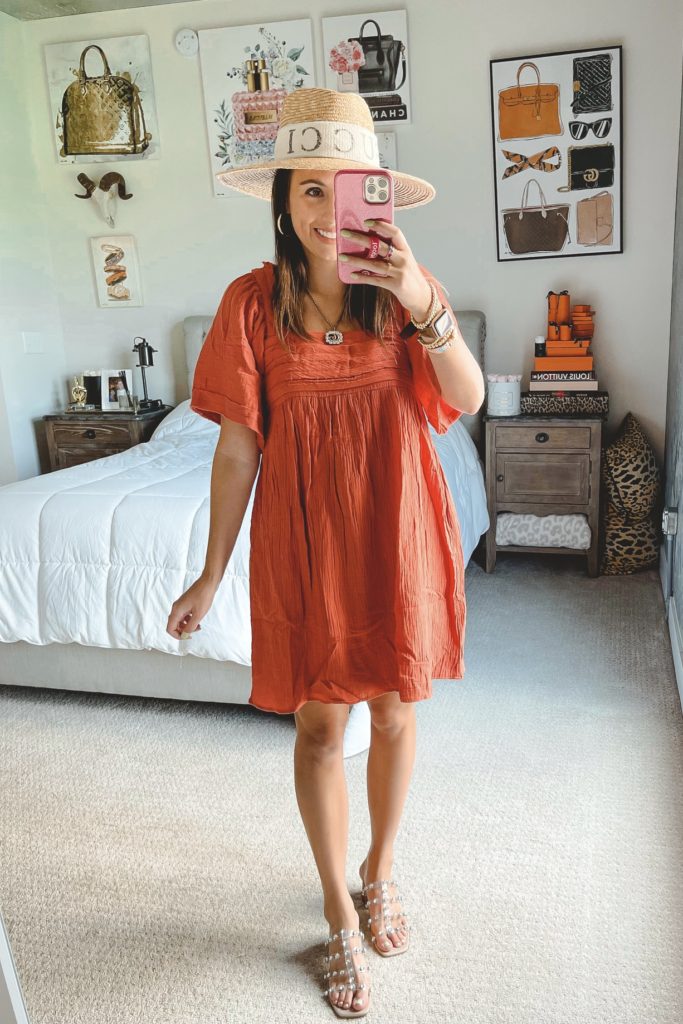 rust mini dress with brixton hat and steve madden intricate sandals