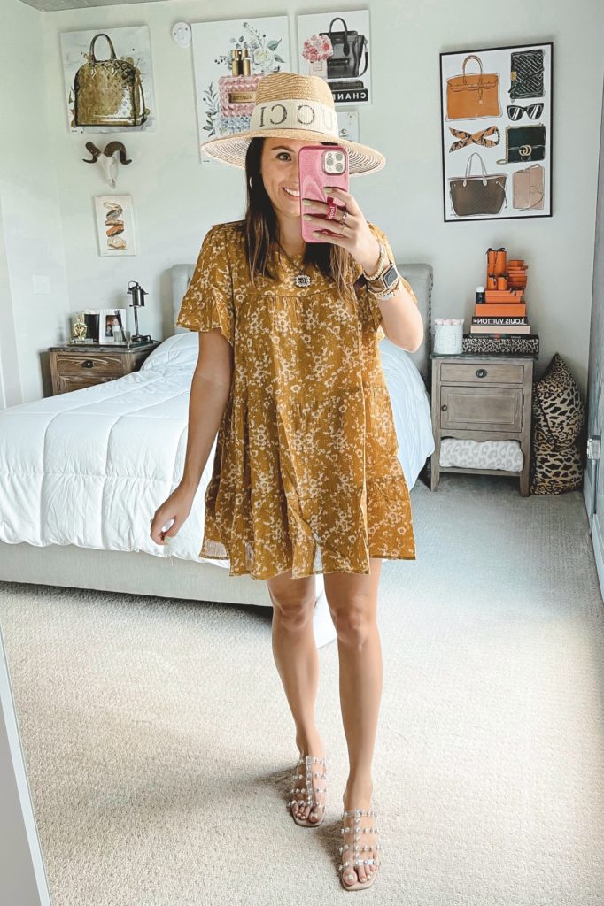 mustard yellow floral mini dress with brixton hat and steve madden intricate sandals