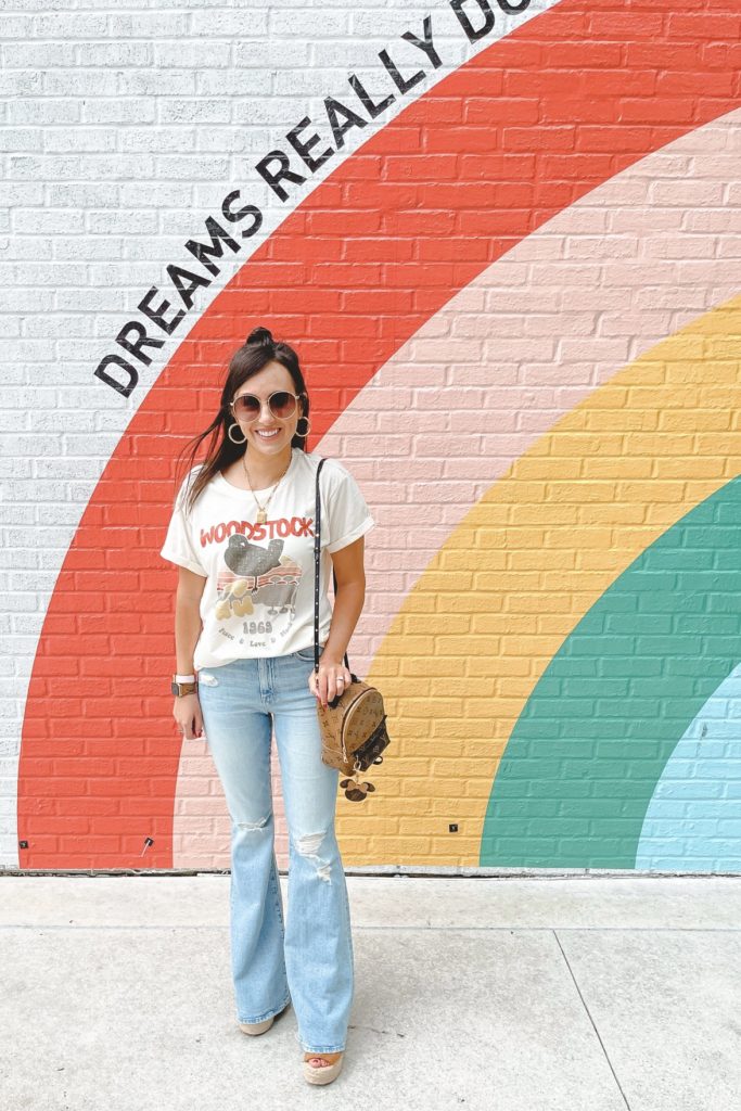 chaser woodstock tee with mother super cruiser flares and gucci sunglasses