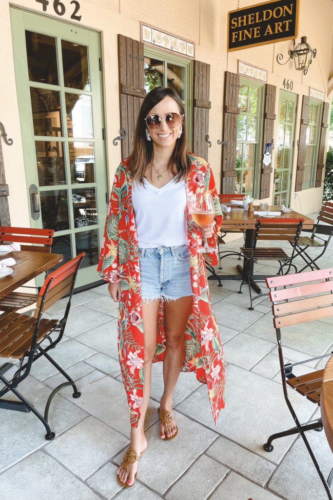 red floral kimono with white tee and agolde denim shorts