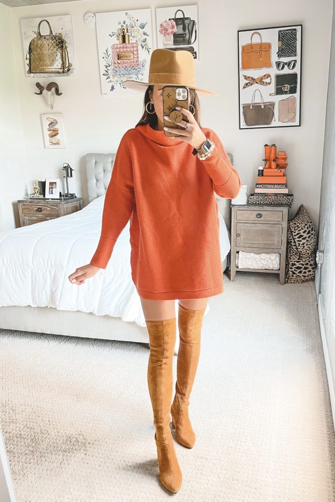 amazon orange tunic with over the knee boots and lack of color mirage hat