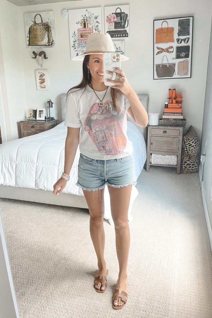 graphic tongue tee with denim shorts and white hat