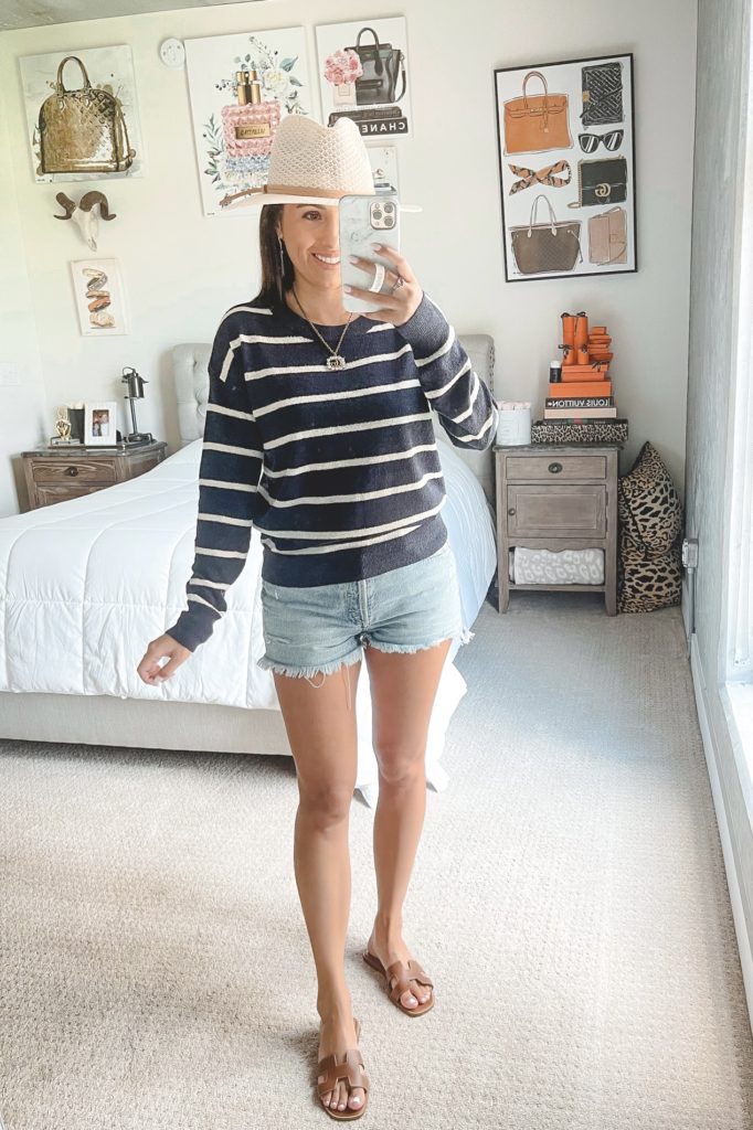 thread supply stripe sweater with denim shorts and white hat