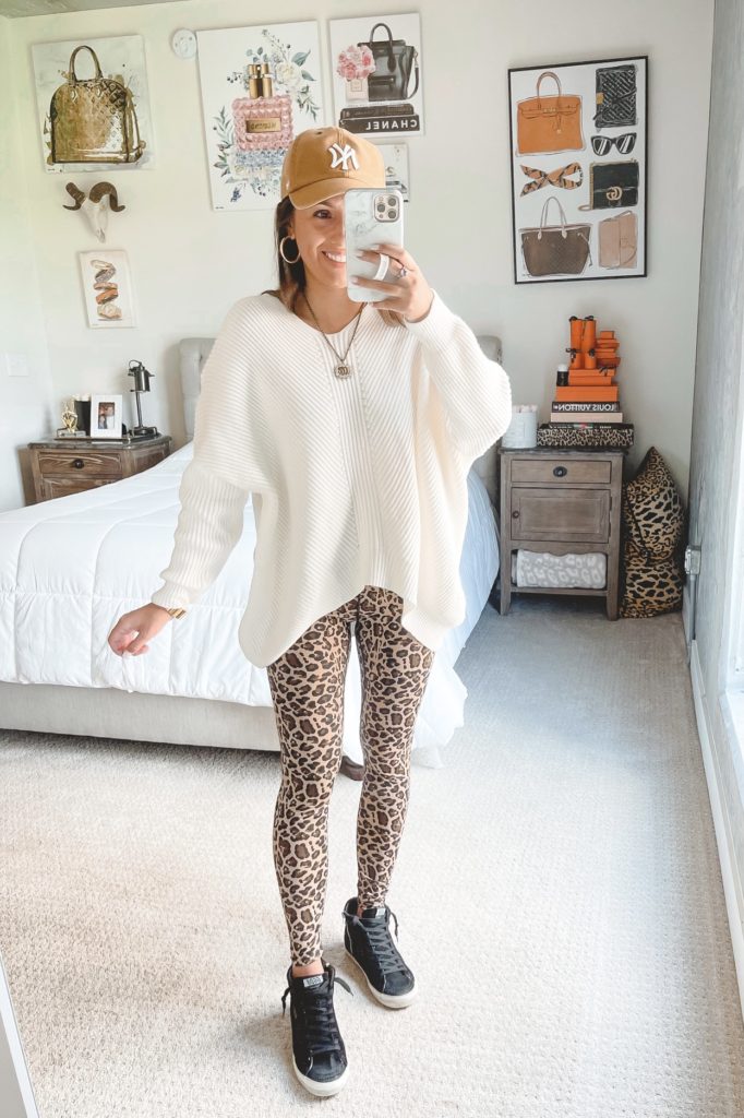 amazon white oversized sweater with leopard leggings and golden goose sneakers