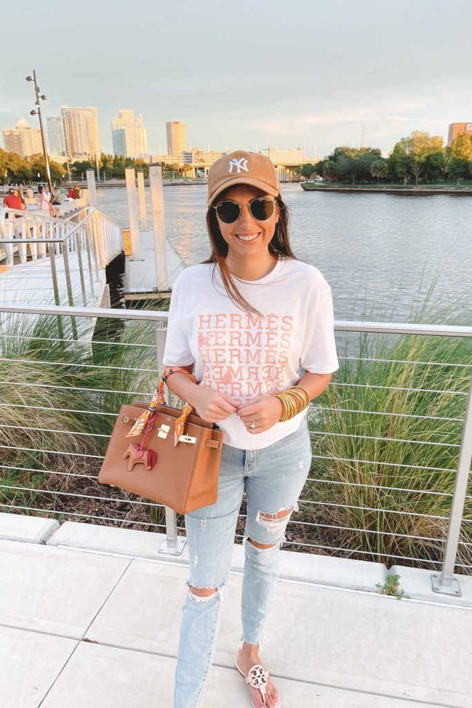hermes tee with gold birkin and jeans