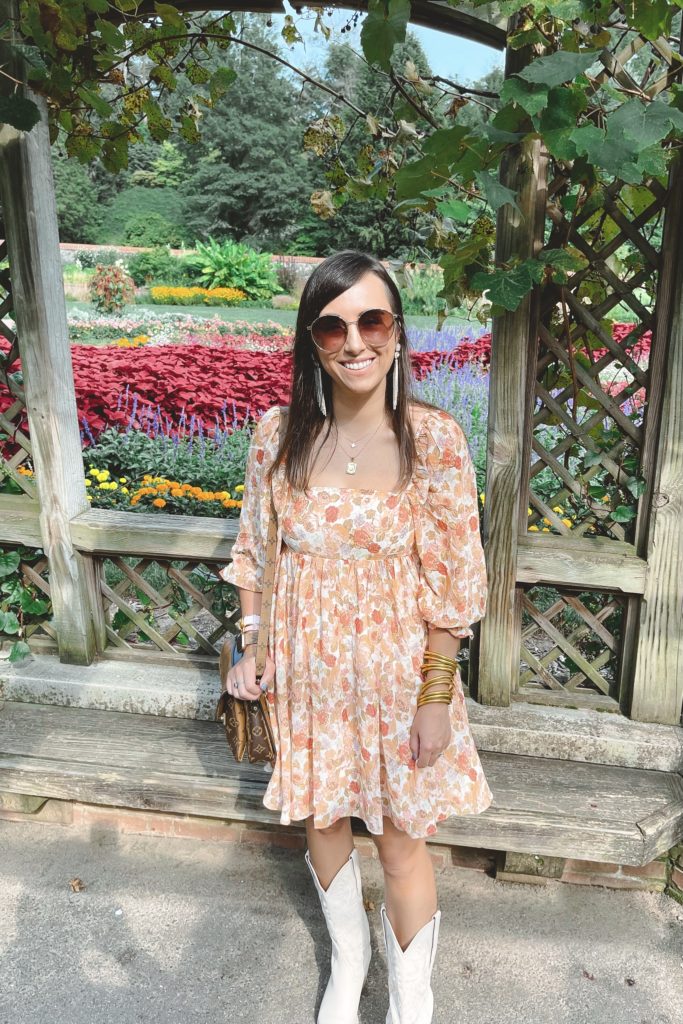 floral dress with jeffrey campbell dagget western boots at the biltmore gardens