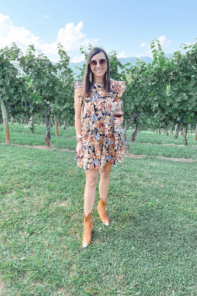 floral dress with cowgirl boots at addison farms winery