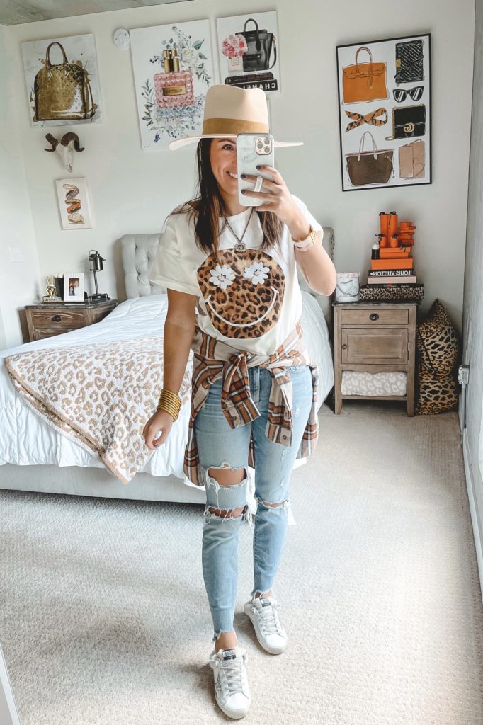 leopard smiley tee with jeans and golden goose sneakers