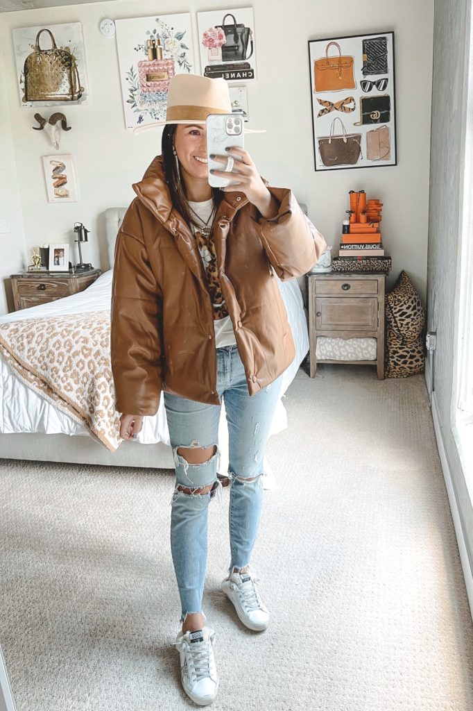 faux leather puffer jacket with skinny jeans and golden goose sneakers
