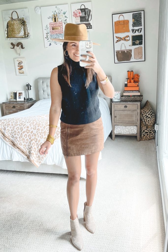 sleeveless mock neck sweater with faux suede mini skirt and booties
