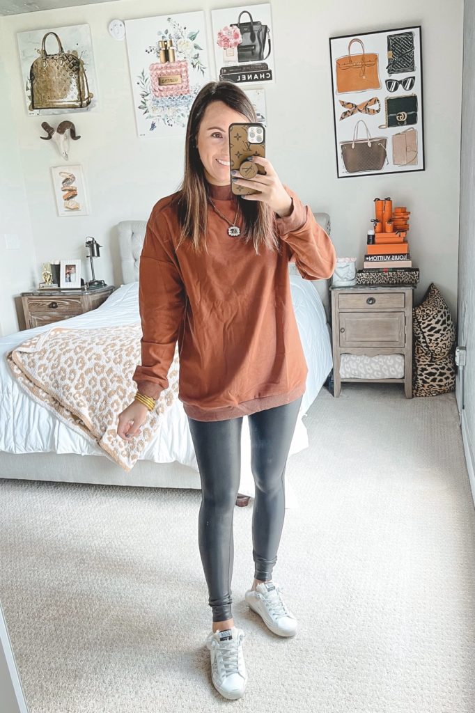 amazon rust sweatshirt with spanx leggings and golden goose shearling mules