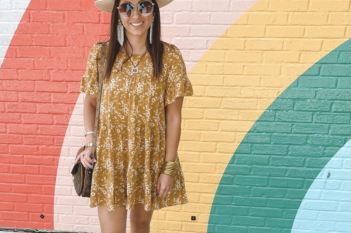 mustard floral dress with tory burch miller sandals and brixton hat