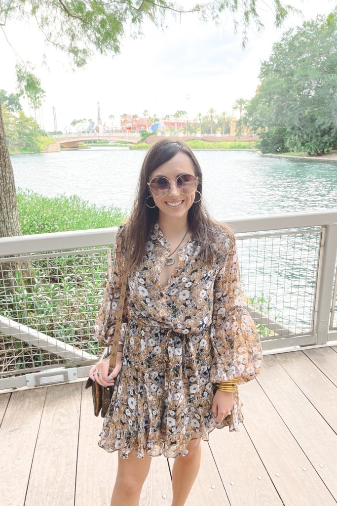 long sleeve floral dress with gucci sunglasses at universal studios