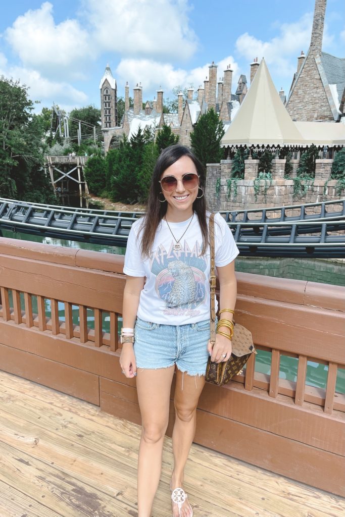 def leppard tee with agolde denim shorts at universal studios