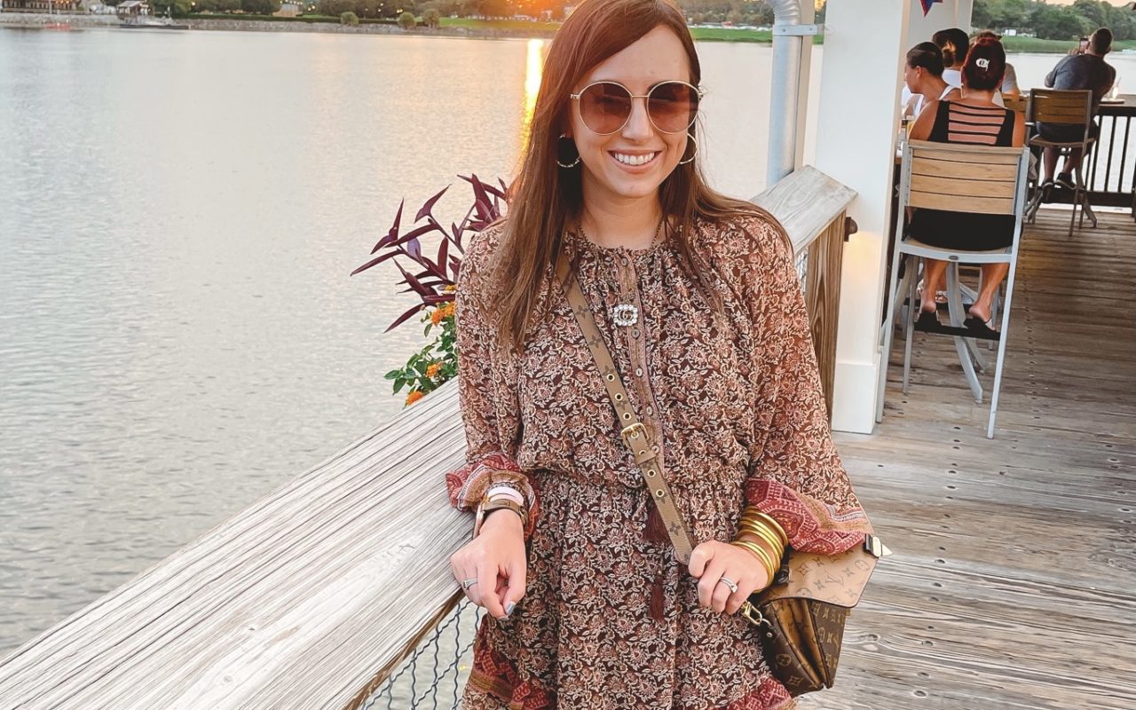 long sleeve boho mini dress with tory burch sandals at boathouse disney springs