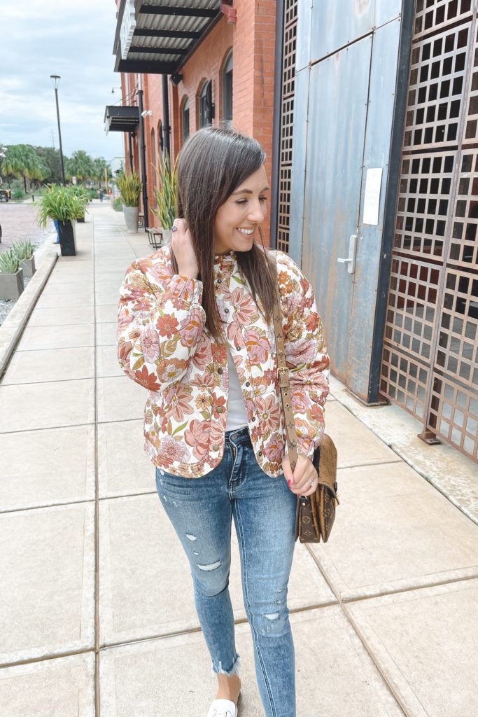 salt water luxe floral jacket with jeans and louis vuitton pochette metis