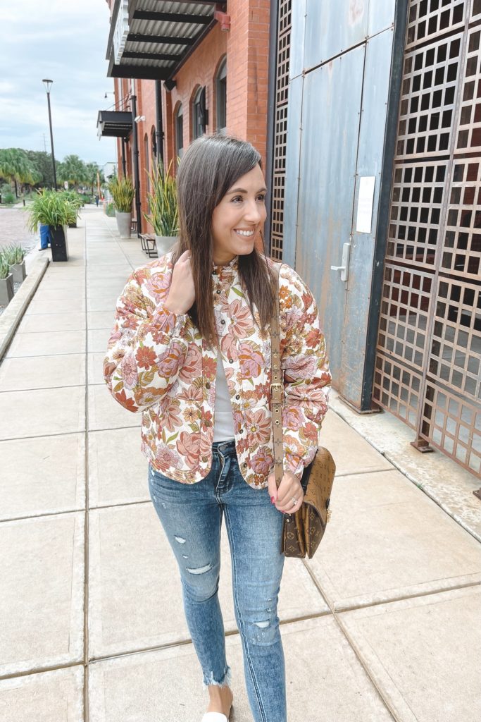 salt water luxe floral coat with jeans and louis vuitton pochette metis