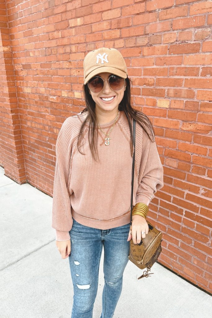 z supply claire waffle knit with skinny jeans and yankees baseball cap