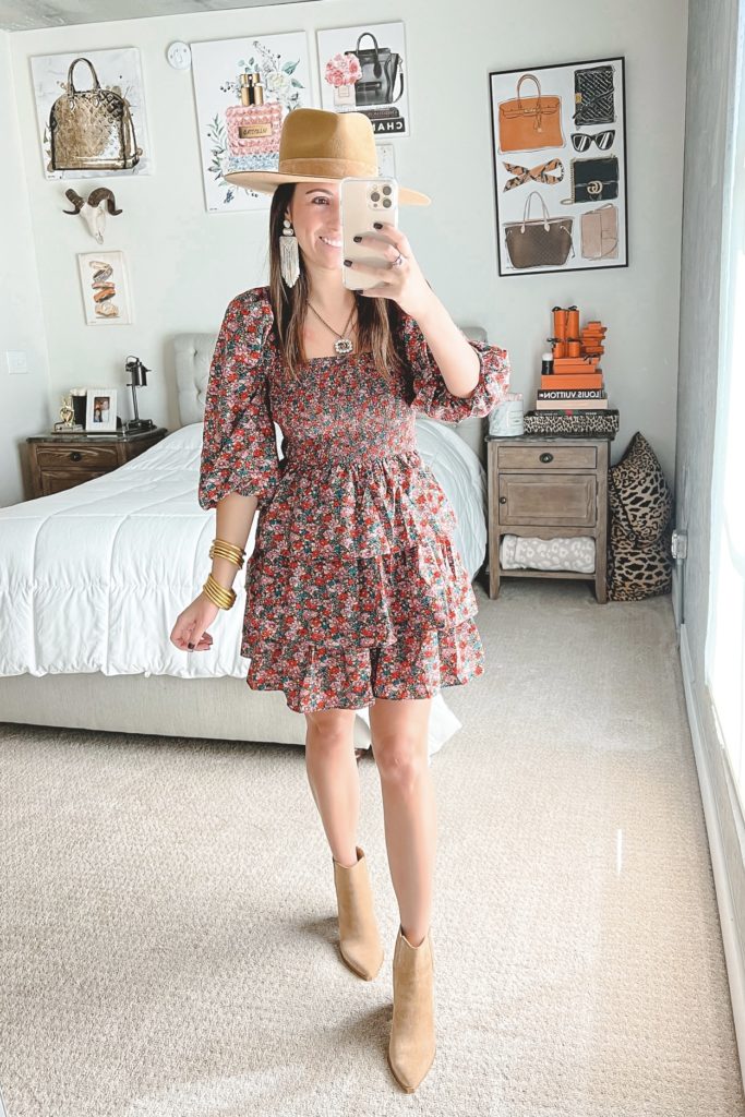 flirty rendezvous floral dress with booties and lack of color hat