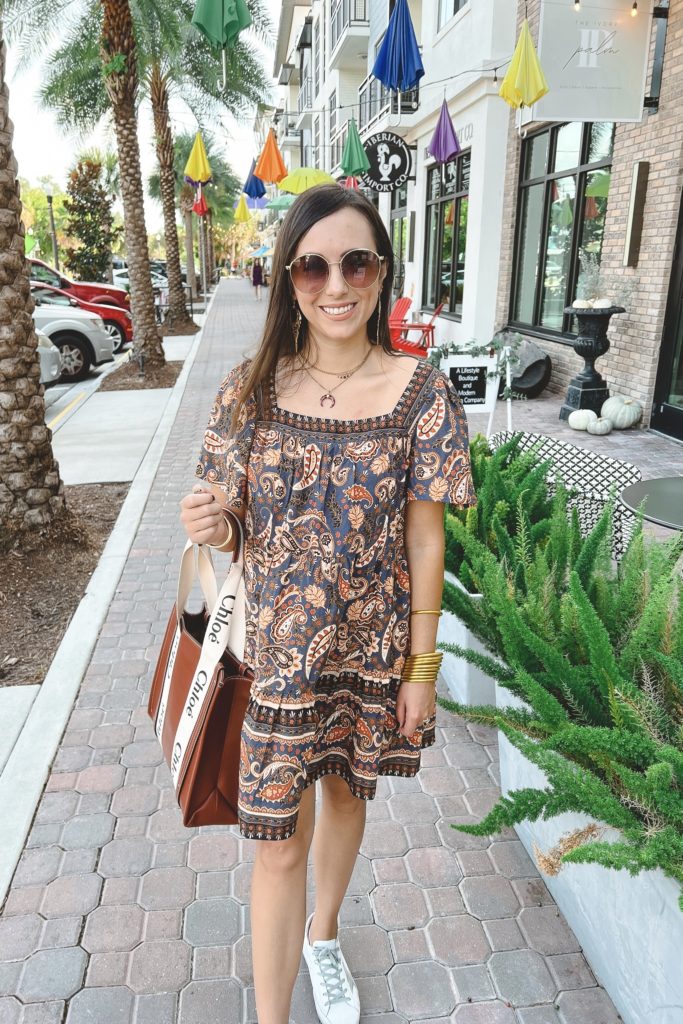 boho paisley dress with chloe woody tote and golden goose sneakers in dunedin florida