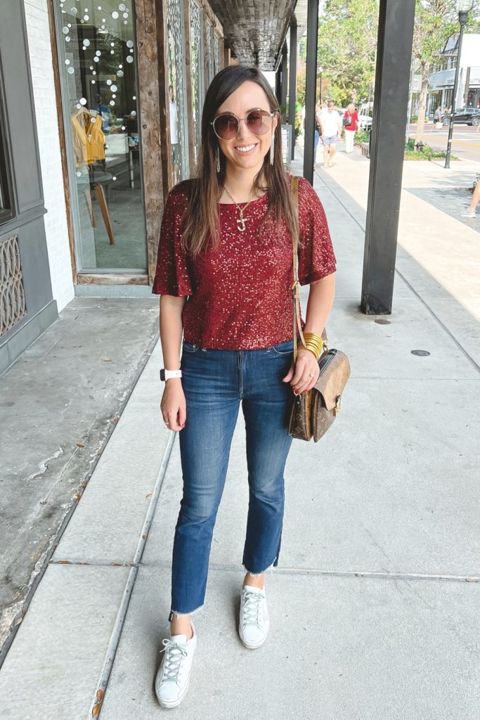 skies are blue sequin top with mother insider denim and golden goose sneakers