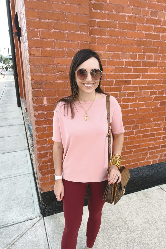 lululemon back in action pink tee with align red merlot leggings and gucci sunglasses