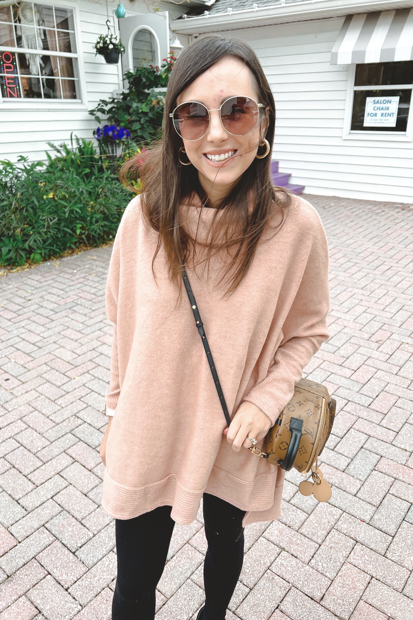 pink lily we can go the distance sweater with black leggings and louis vuitton palm springs mini