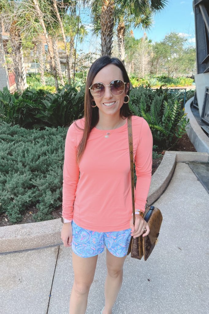 lilly pulitzer blue ocean trail shorts with coral sun guard shirt and gucci sunglasses