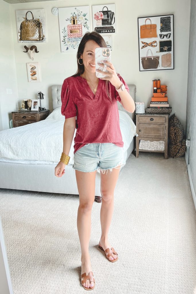 amazon burgundy puff sleeve tee with agolde denim shorts and hermes oran sandals