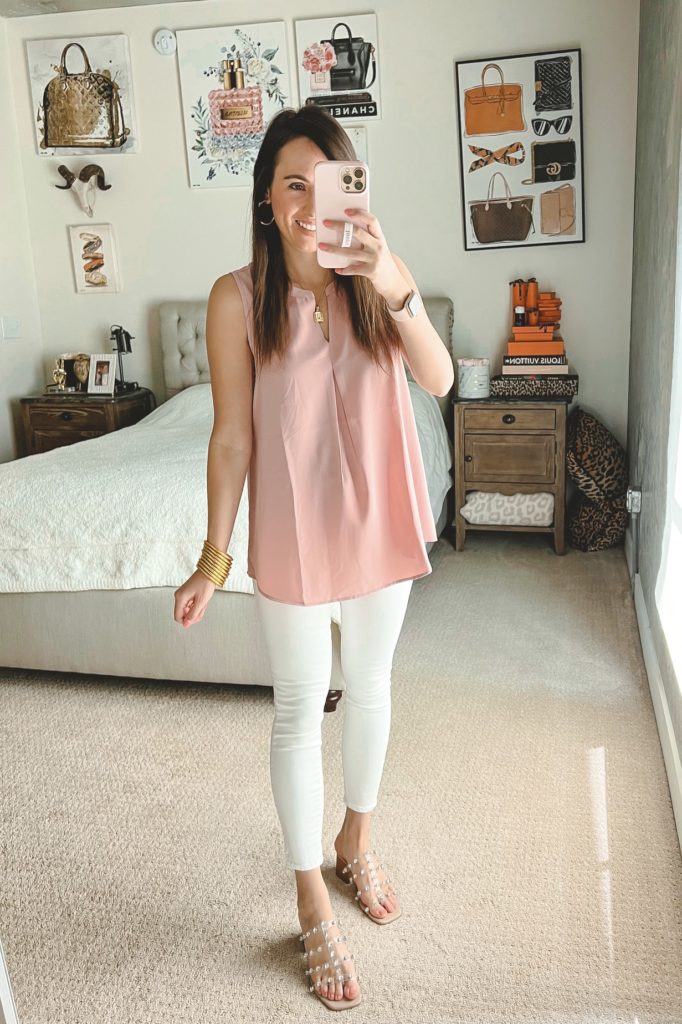 amazon pink sleeveless blouse with white jeans and clear sandals