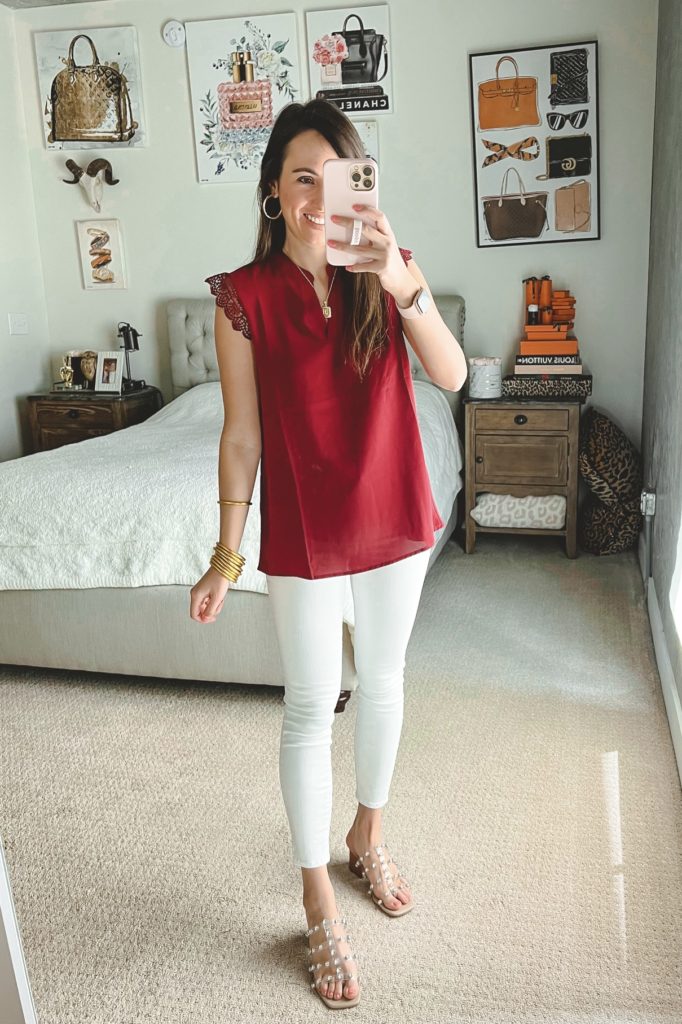 amazon burgundy sleeveless blouse with white jeans and clear sandals
